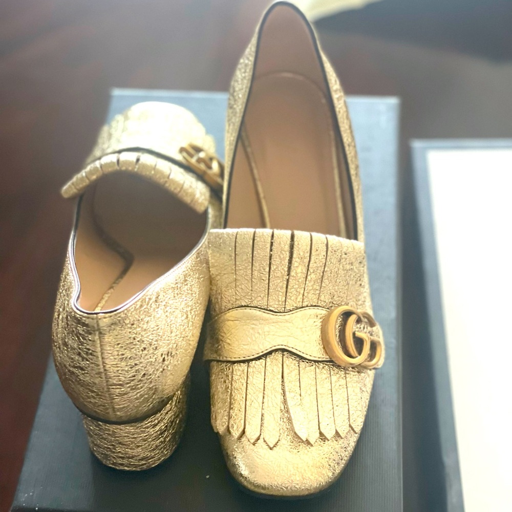 Gucci marmont loafers in metallic gold. Original box and duster bag included.